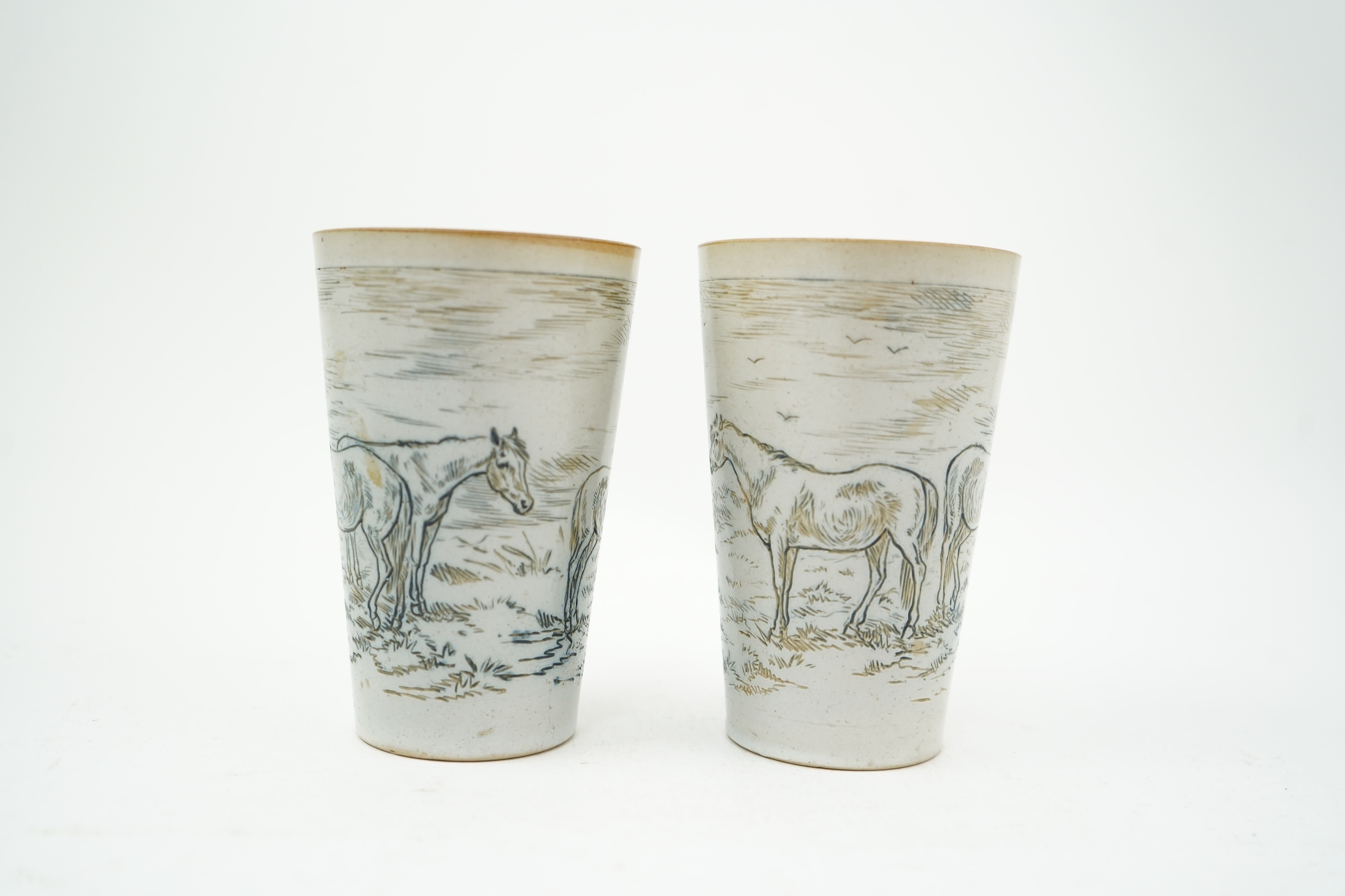 Hannah Barlow for Doulton Lambeth: A Stoneware Lemonade jug and two beakers